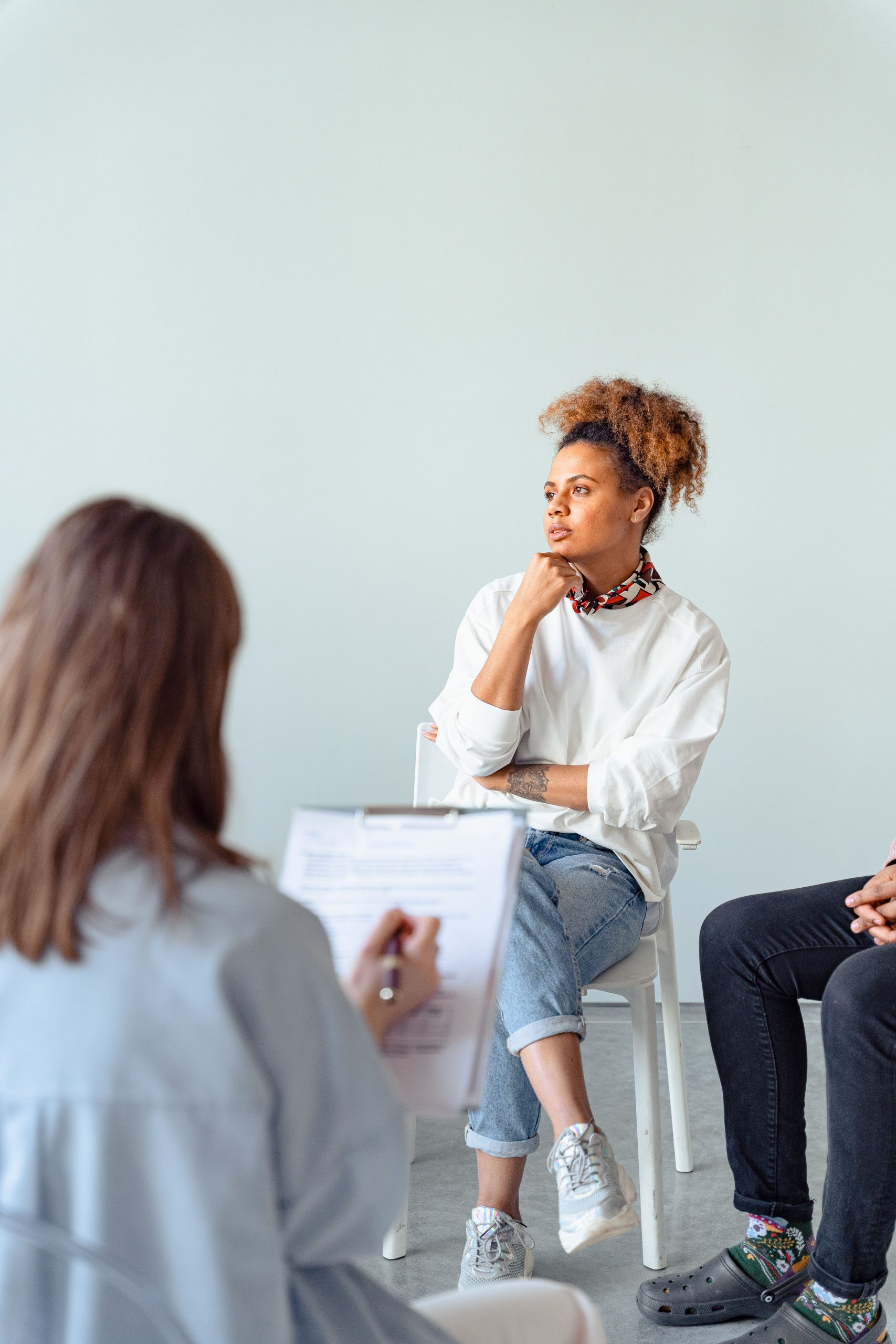 Couple having conversation with counselor